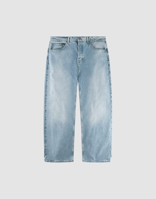 The LFDY Baggy Denim by LIVE FAST DIE YOUNG features light blue, high-waisted jeans with a baggy, straight-leg fit, classic five-pocket design, button and zipper closure, laid flat on a plain light gray background. | plain