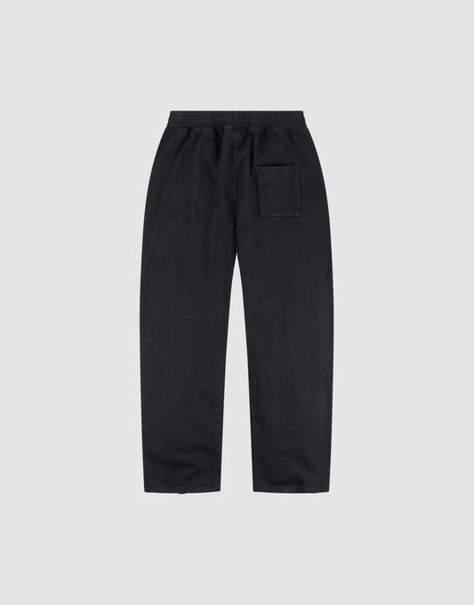 The LFDY Praying Jogger by LIVE FAST DIE YOUNG is shown laid flat on a light gray background, featuring a wide fit, elastic waistband, right-side back pocket, and a subtle Reißverschluss Puller detail for style.