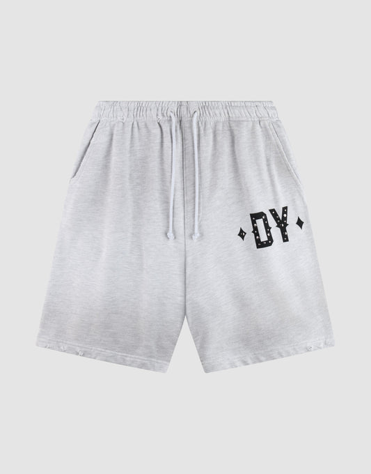 The DY Rivet Shorts by LIVE FAST DIE YOUNG feature a light gray color, elastic waistband with drawstring, side pockets, and black DY lettering with diamond accents. Made from 100% Baumwolle in an Oversize Fit for maximum comfort. | plain