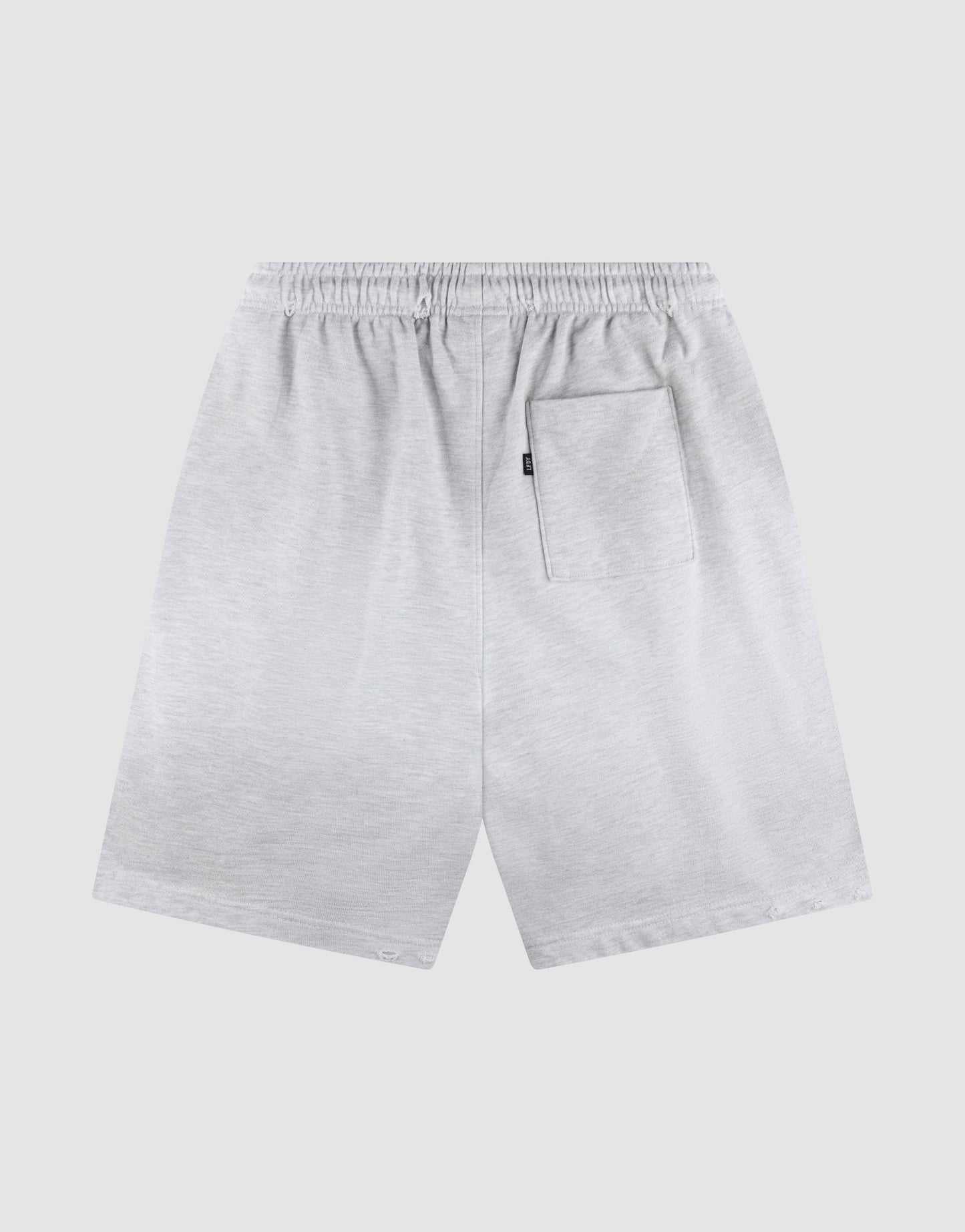 The DY Rivet Shorts by LIVE FAST DIE YOUNG are light gray athletic shorts shown from the back, featuring an elastic waistband and a right patch pocket. Made from 100% Baumwolle for comfort and breathability.
