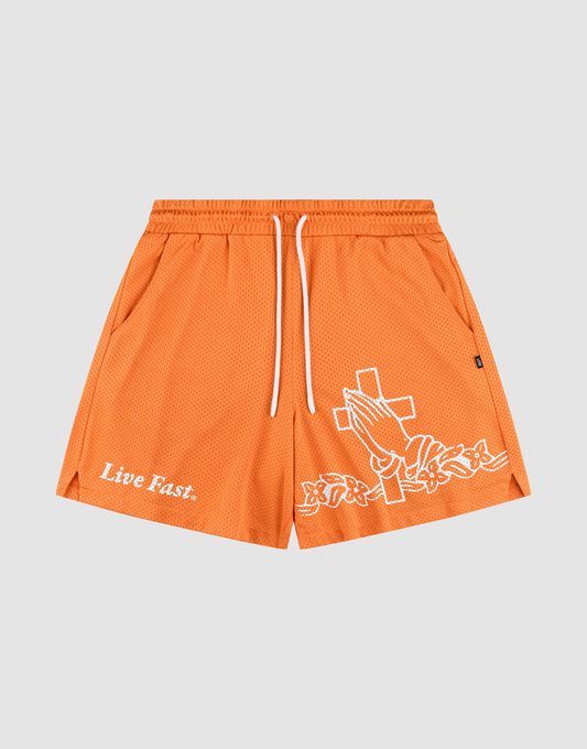 The LFDY Praying Mesh Shorts by LIVE FAST DIE YOUNG are orange polyester mesh shorts with a regular fit, elastic waistband, white drawstring, white graphics of praying hands, cross, florals on one leg, and "Live Fast." on the other. | plain