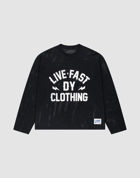 The LFDY Flash Jersey by LIVE FAST DIE YOUNG is a black long-sleeve, oversize fit shirt with a bold white "LIVE FAST DY CLOTHING" front print and a small blue-and-white LFDY patch near the hem, shown on a plain background. | plain