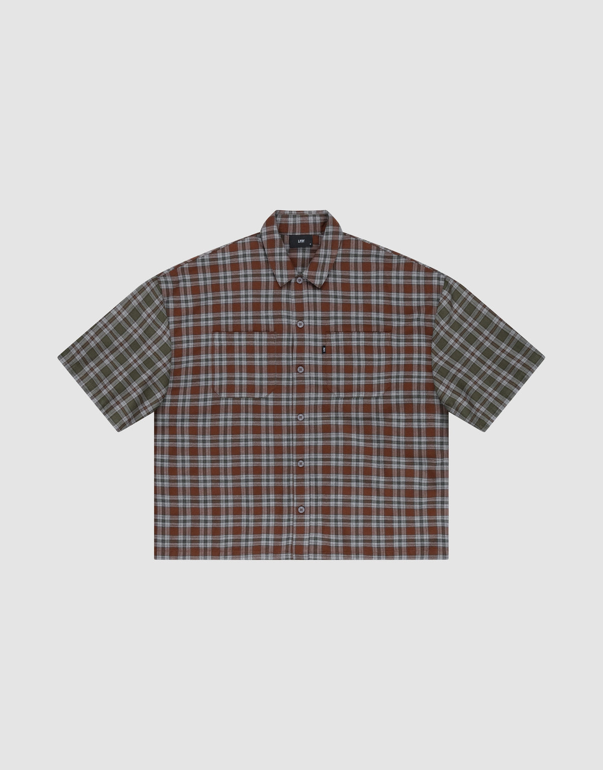 The LFDY Light Flannel by LIVE FAST DIE YOUNG is a short-sleeved, button-up shirt with brown, green, and white plaid, an oversize fit, left chest pocket, and is made from 100% Baumwolle. Shown against a plain light gray background. | plain