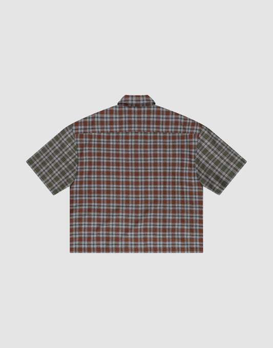 The LFDY Light Flannel by LIVE FAST DIE YOUNG is a short-sleeved, oversized button-up with mixed red/blue and green plaid panels, vintage washed look, and made from 100% cotton. Shown laid flat on a light background.