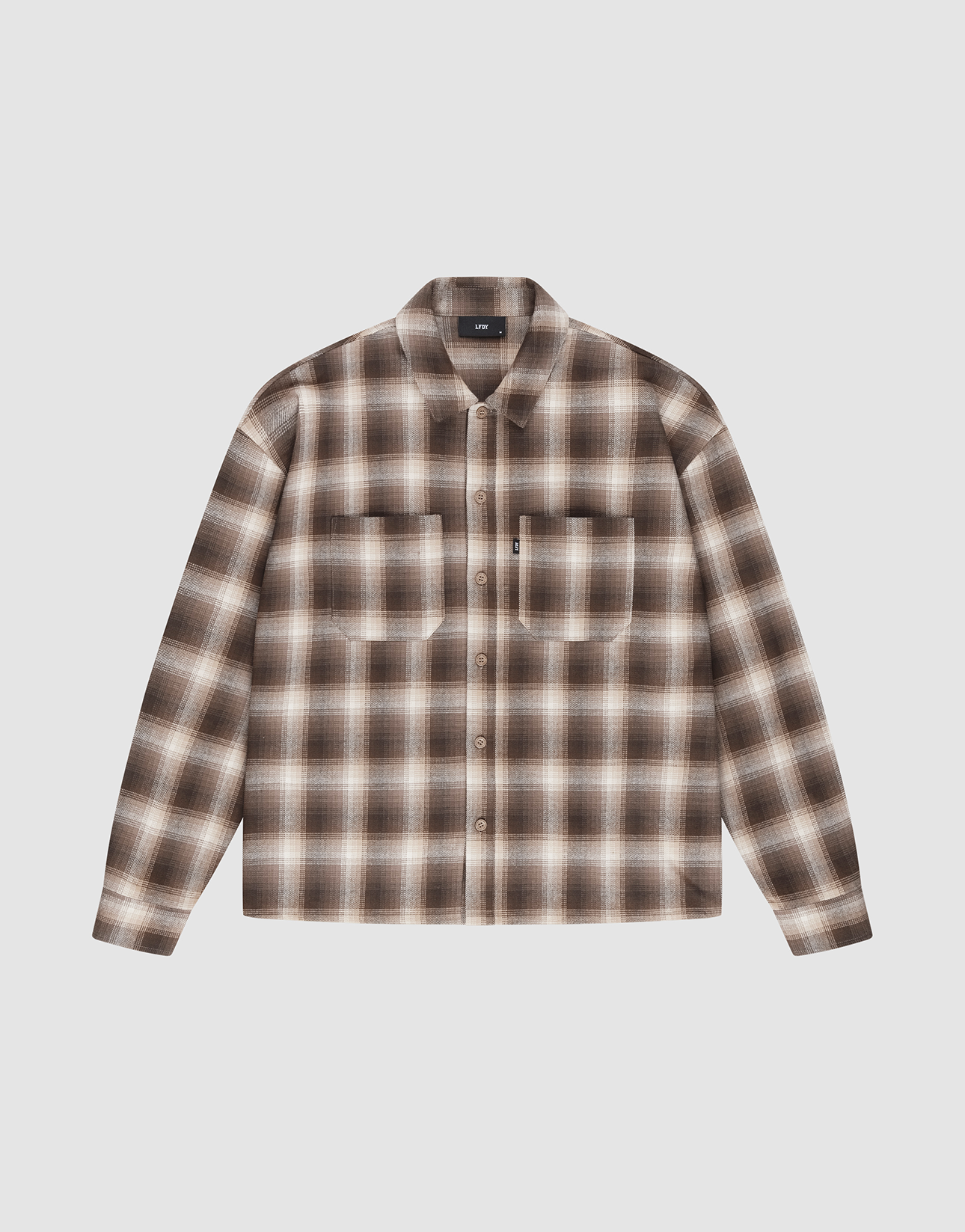 The Vintage Flannel by LIVE FAST DIE YOUNG features brown, beige, and white plaid, an oversized fit, two chest pockets, subtle branding, and is shown on a plain white background. | plain