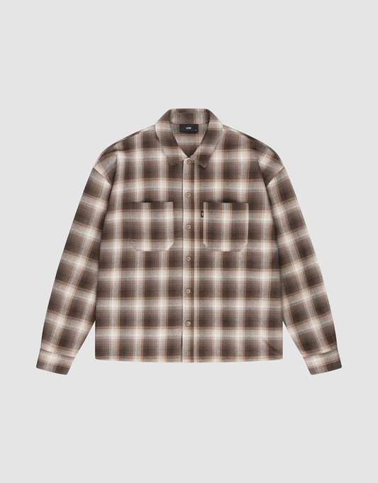The Vintage Flannel by LIVE FAST DIE YOUNG features brown, beige, and white plaid, an oversized fit, two chest pockets, subtle branding, and is shown on a plain white background. | plain