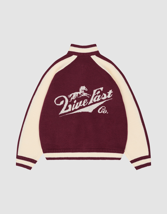 A maroon and cream Boxy Knit Zip Jacket by LIVE FAST DIE YOUNG, featuring long sleeves, a galloping horse intarsia, “Live Fast Co.” text on the back in white, and striped cuffs, collar, and hem for a bold yet classic style.| plain