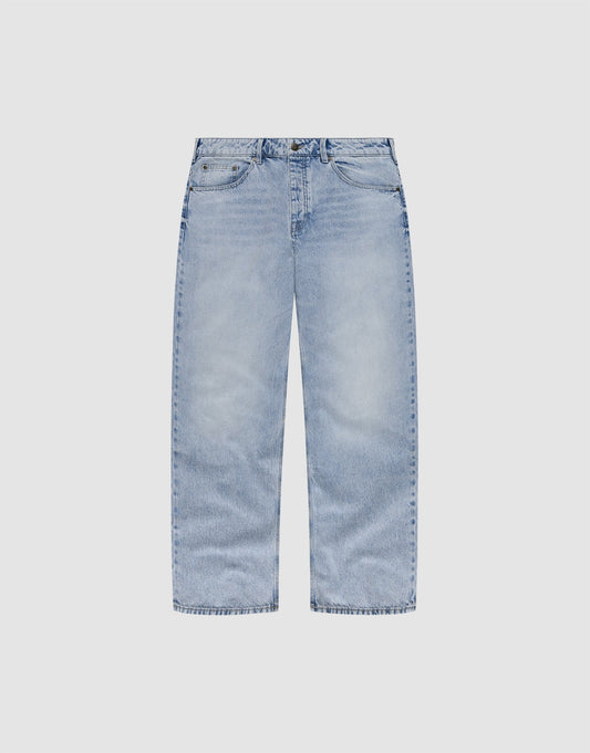 The LFDY Baggy Denim by LIVE FAST DIE YOUNG is a light blue, 100% cotton jean with a wide straight leg, classic five-pocket design, and relaxed baggy fit, shown laid flat on a plain white background. | plain