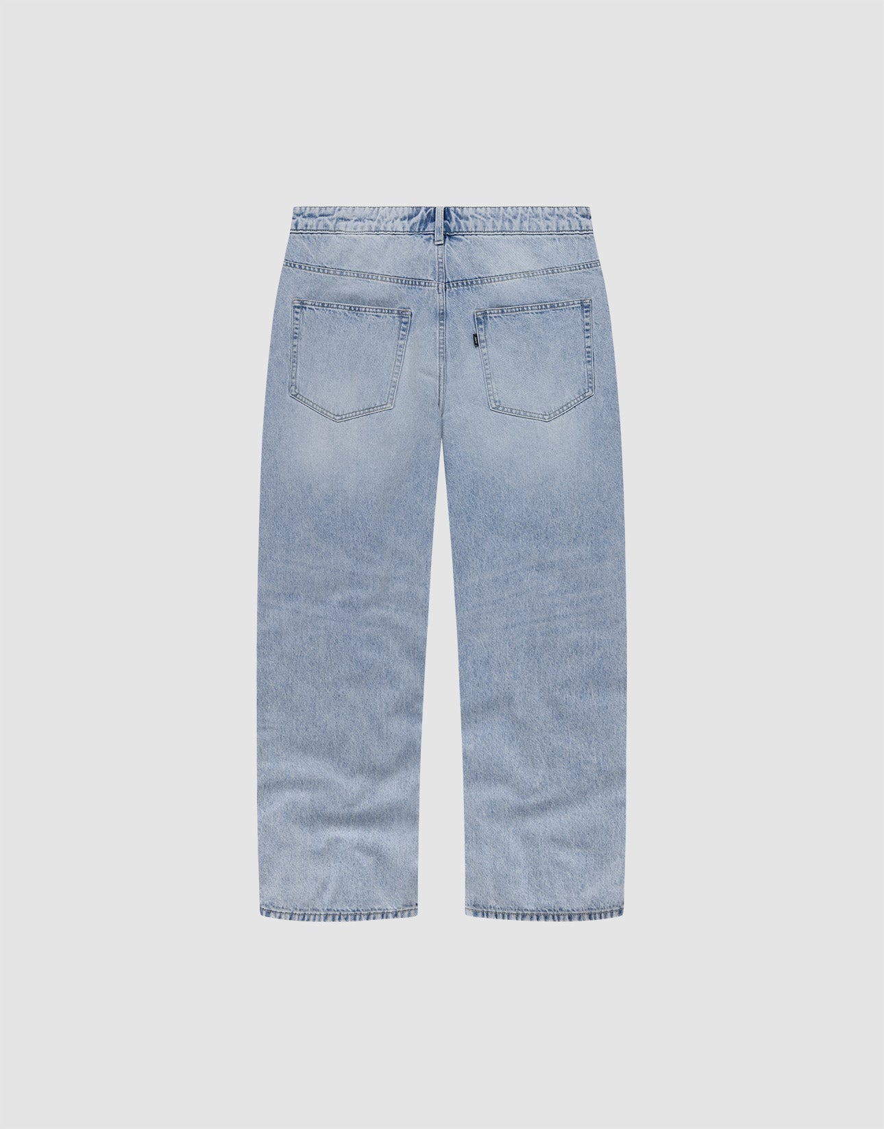 The LFDY Baggy Denim by LIVE FAST DIE YOUNG features light blue 100% cotton, two back pockets, a baggy fit with wide straight legs, shown from the back against a plain white background.