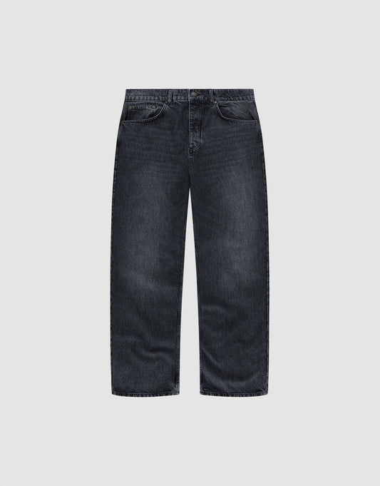 The LFDY Baggy Denim by LIVE FAST DIE YOUNG features a wide straight leg, dark-wash finish, and classic five-pocket design, shown against a plain light grey background. | plain