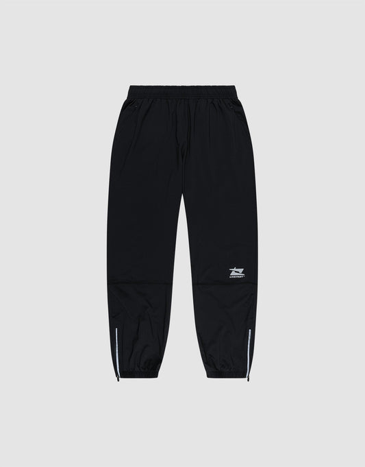 LIVE FAST DIE YOUNG’s Live Fast Performance Running Pants feature a black design with an elastic waistband, cuffed and zippered ankles, plus a small white logo on the left thigh, shown against a plain light gray background. | plain