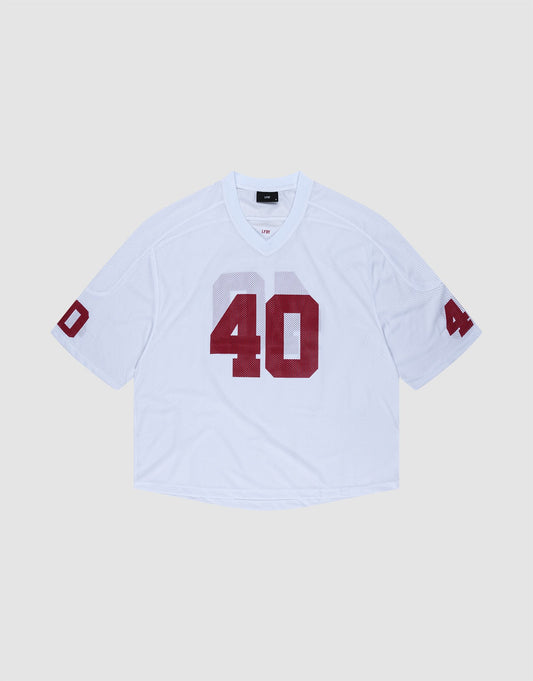 The LFDY Mesh Jersey by LIVE FAST DIE YOUNG is a white polyester football jersey with an oversize fit, short sleeves, and bold red number 40 on the front and sleeves. It features a V-neck collar and is shown on a light gray background. | plain