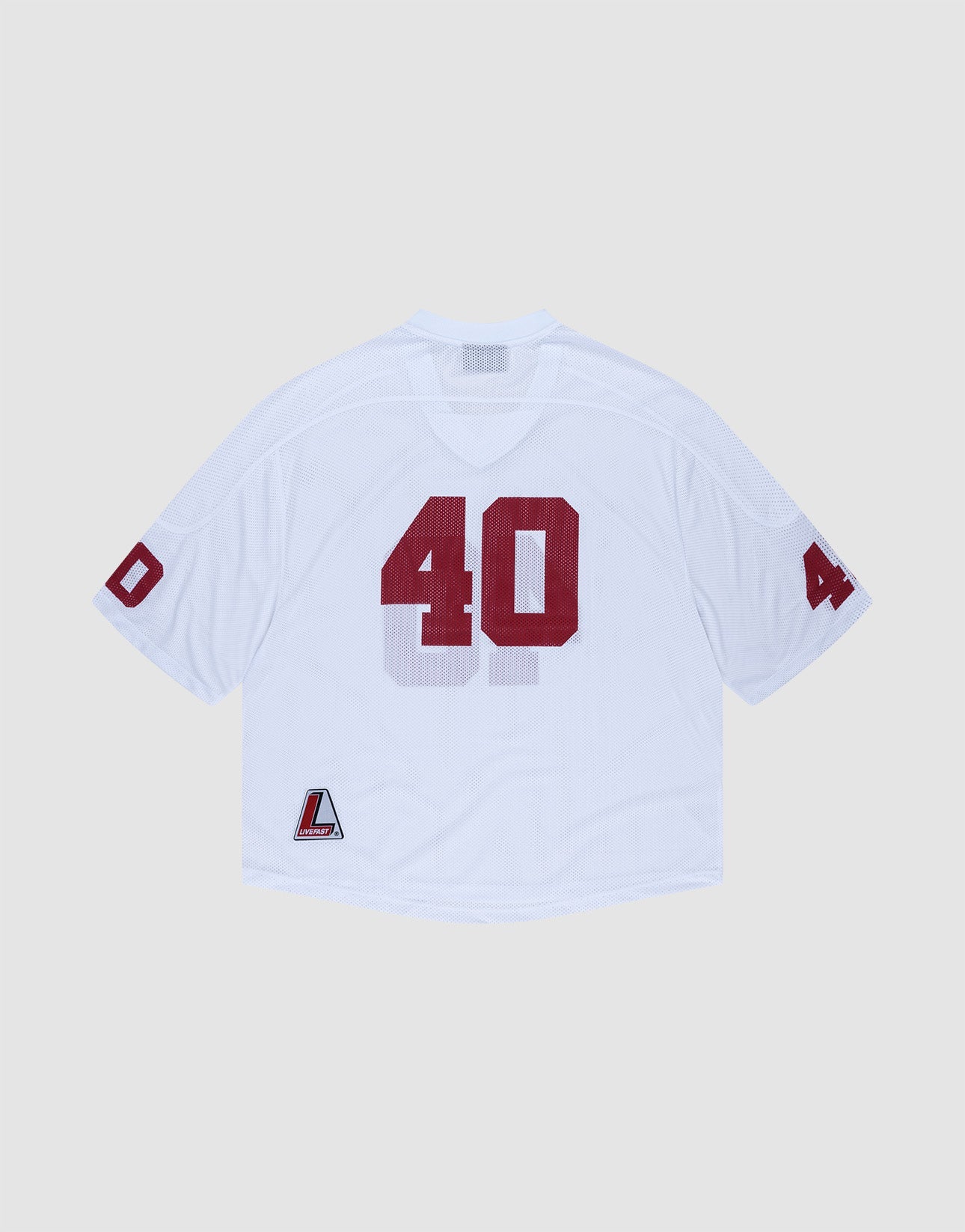 The LFDY Mesh Jersey by LIVE FAST DIE YOUNG is a white polyester V-Ausschnitt sports top with an oversize fit, featuring red number 40 on back and sleeves, a small L logo patch at the bottom left hem, and is displayed flat on a light background.