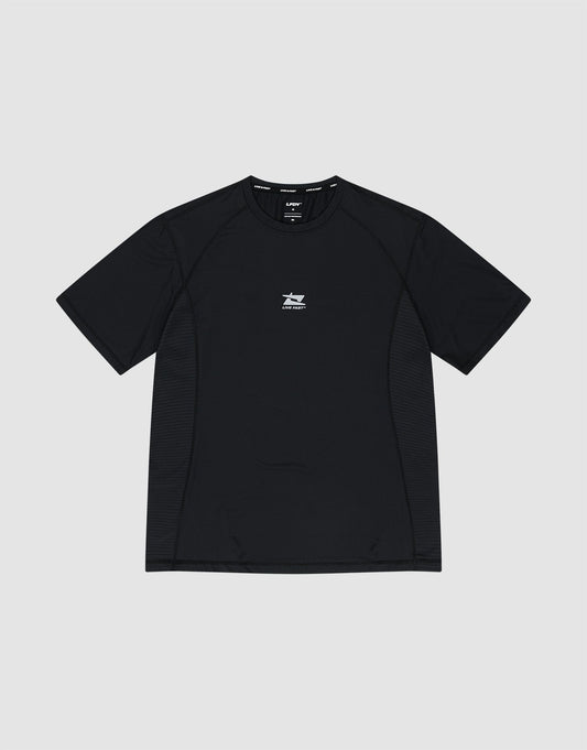 The LIVE FAST DIE YOUNG Live Fast Performance Tee is a slim-fit black short-sleeve athletic shirt featuring a small white graphic and text on the chest, shown flat on a light gray background. | plain