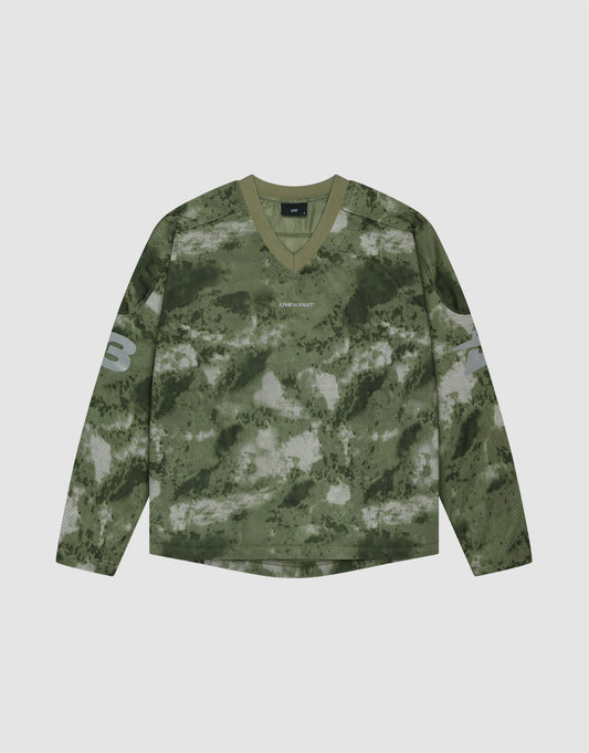 The LIVE FAST DIE YOUNG Camo Mesh Jersey is an oversized, long-sleeve V-neck shirt in green camo, with the number 3 on each sleeve and a small reflective LIVE FAST print on the chest. It is shown laid flat on a light background.