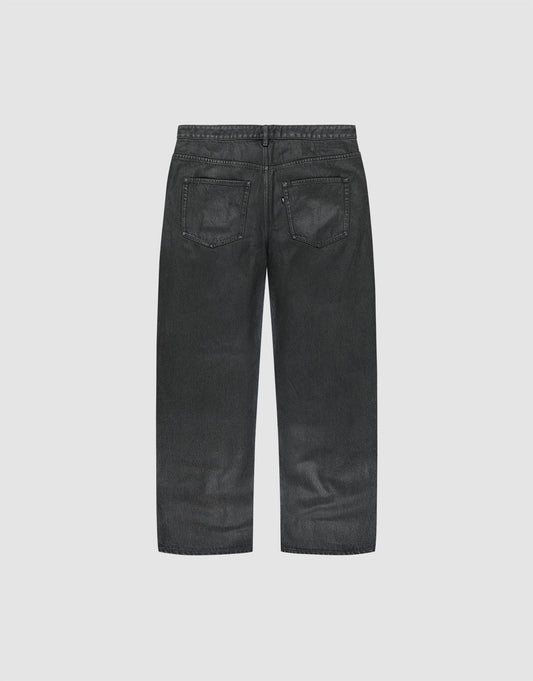 The LFDY Coated Baggy Denim by LIVE FAST DIE YOUNG is shown from the back, featuring two rear pockets and visible stitching, crafted from 100% Baumwolle with a wide straight-leg design against a plain light background.