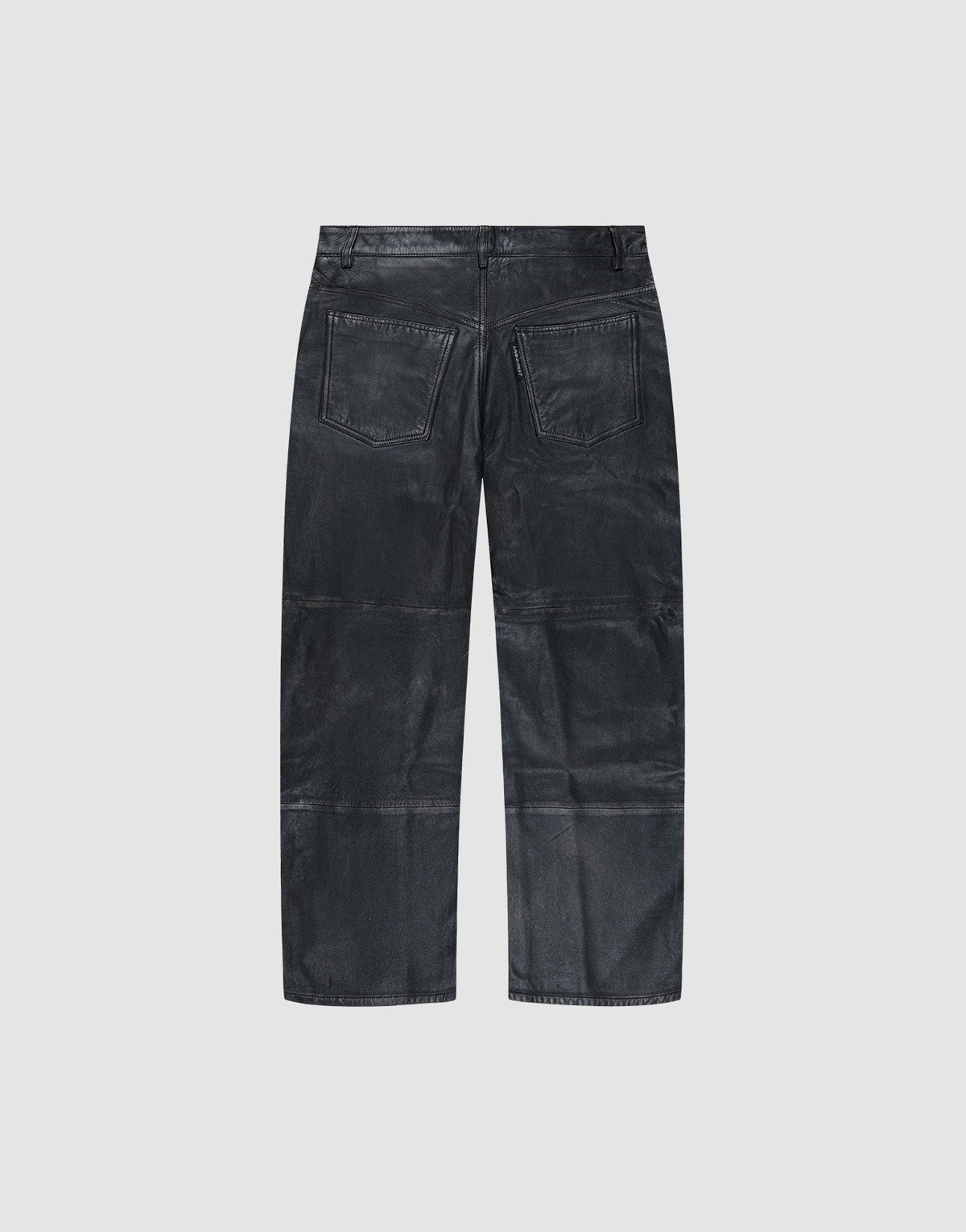 The Baggy Leather Pants by LIVE FAST DIE YOUNG are shown from the back in black sheep leather, with two rear pockets and a straight leg, set against a plain light gray background.