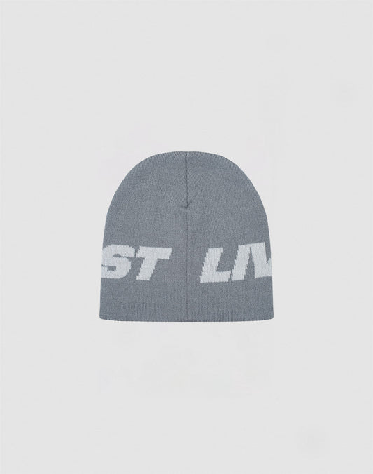 The Live Fast Jacquard Beanie by LIVE FAST DIE YOUNG is a gray Polyacryl knit beanie with a bold white ST LIV logo. Shown on a light background. Style code: LF2410-16486.