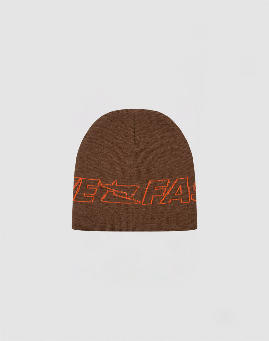 The Live Fast Jacquard Beanie by LIVE FAST DIE YOUNG is a brown 100% Polyacryl knit, featuring bold orange FAST lettering and a Logo Strick arrow design. Shown on a light gray background. Style code: LF2410-16485.