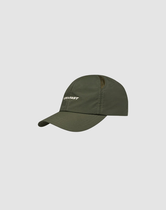 The LFDY Performance Cap by LIVE FAST DIE YOUNG is an olive green nylon cap with geometric air holes, a curved brim, and "LIVE FAST" embroidered in white on the front, shown on a plain light gray background.